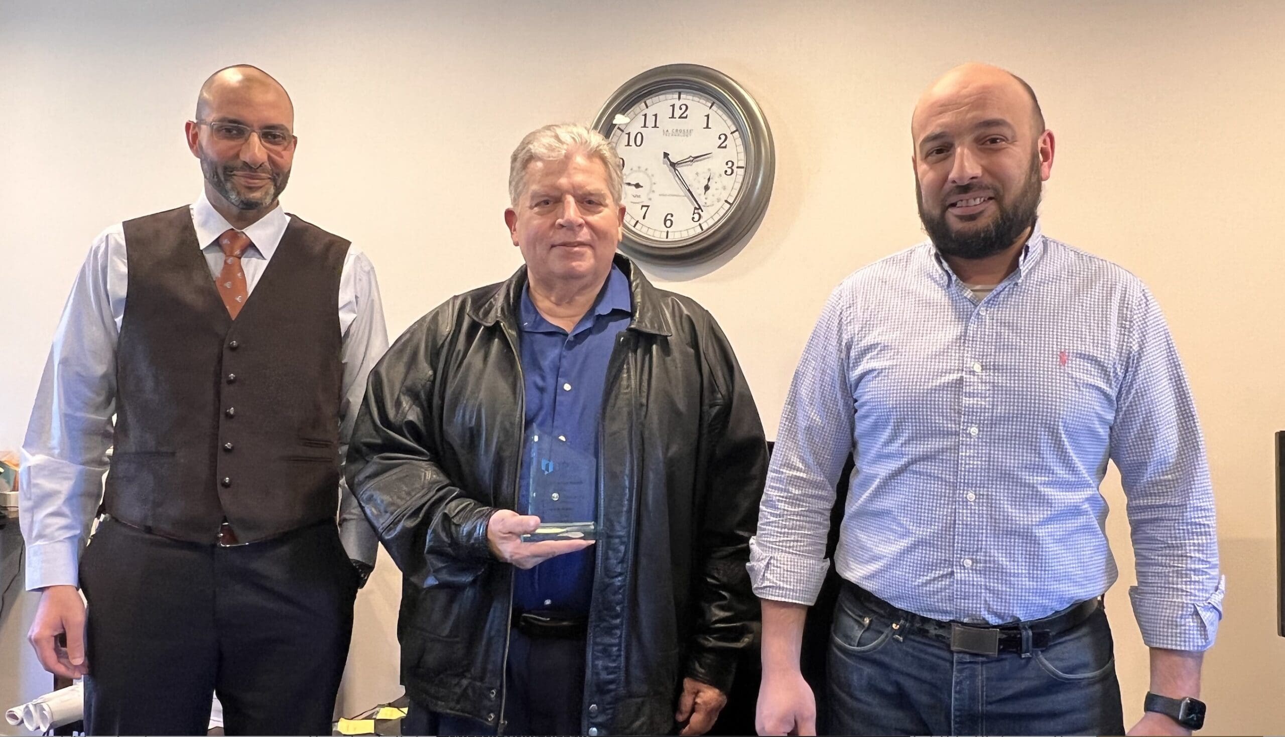 JR Group Managing Partners Present Appreciation Award